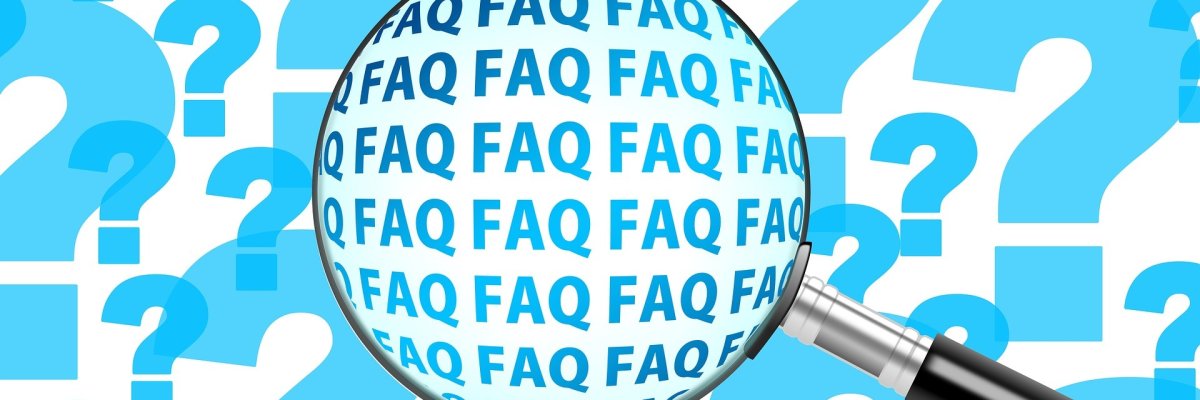 Bild: Fragezeichen mit Lupe die FAQ anzeigt